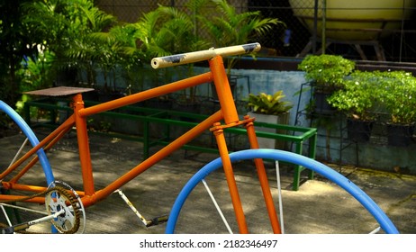 An old bicycle modeled in a park - Powered by Shutterstock