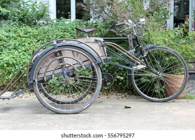 Old Bicycle Sidecar Parking On Concrete Floor.