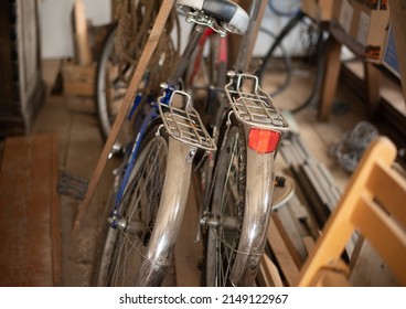 Old Bicycles In A Cluttered Garage