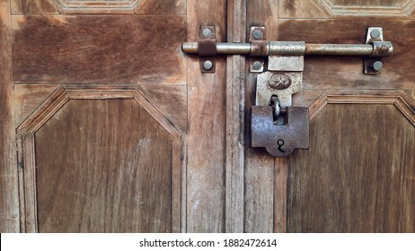 Old Big Antique Pad Lock On Closed Wooden Door Of Indian Fort