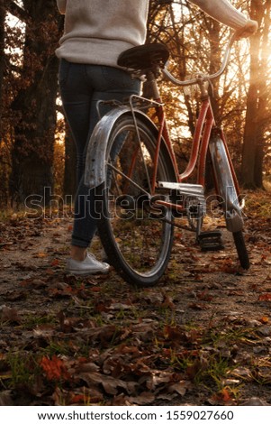 Similar – Image, Stock Photo Woman with a bike in the middle of the forest.