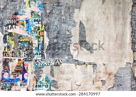 Old Billboard with Torn Posters. Vintage Background and Texture for text or image