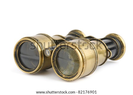 Old binoculars on white background