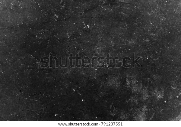 Old black background. Grunge wallpaper.\
Chalkboard. Grung. Cement