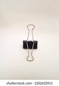 An Old Black Binder Clip That Has Been Stored And Not Used For A Long Time