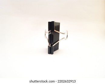 An Old Black Binder Clip That Has Been Stored And Not Used For A Long Time