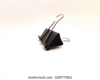 An Old Black Binder Clip That Has Been Stored And Not Used For A Long Time