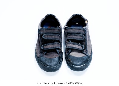 Old Black Color School Shoes Worn Out Isolated On White Background