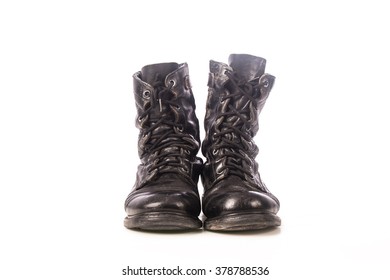 Old Black Combat Boots On White Background