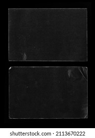 Old Black Empty Aged Damaged Paper Cardboard Photo Card Isolated on Black. Real Halftone Scan. Folded Edges. Rough Grunge Shabby Scratched Torn Ripped Texture. Distressed Overlay Surface for Collage. 