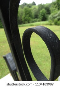 Old, Black, Iron Scroll Work And Railing