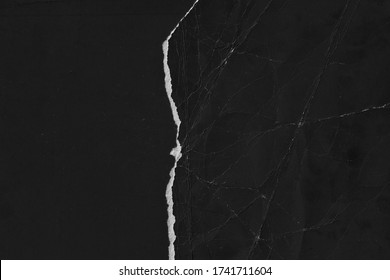 Old black paper texture. Grain texture backgound. Torn page. Blackboard for text - Shutterstock ID 1741711604