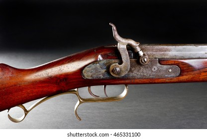 Old black powder cap and ball double trigger rifle.