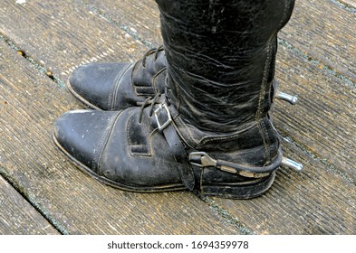 Old Black Riding Boots Made From Leather With Buckled Spurs With Short Blunt Ends