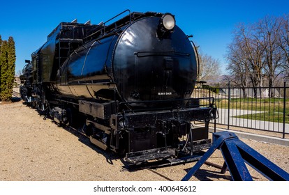 Old black train Engine on display