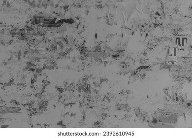 Old black and white dirty tattered paper bulletin board texture background.