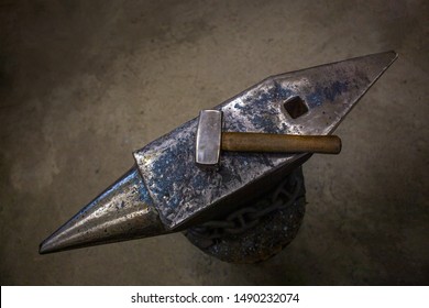 old blacksmith anvil after work, hammer and anvil, traditional tools for working with metal