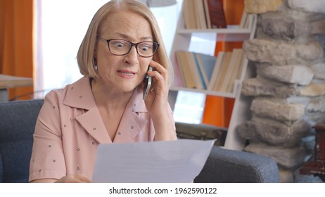 The old blonde woman is getting angry on the phone for high invoice and asking for an account. High invoice concept.