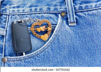 old blue jean front with heart sign and key car  of trouser
