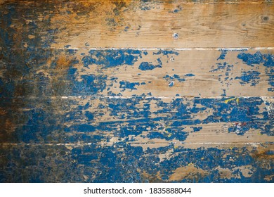 Old Blue Paint Chipping Off Wood	
