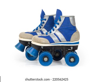 Old blue roller skates isolated on white background