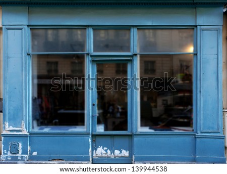 Old blue shop in Paris with lots of copy space