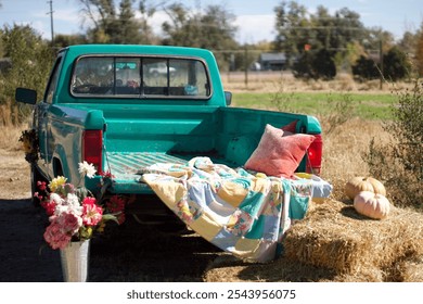 Old Blue Truck with Blankets and Pillows in the Bed - Powered by Shutterstock