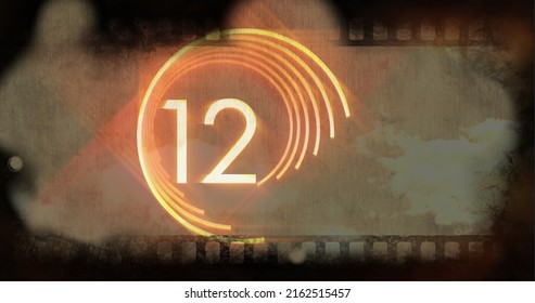 Old blurry movie countdown with red lights - Powered by Shutterstock