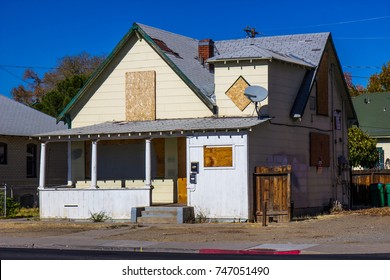 Old Boarded Up Home Lost To Foreclosure