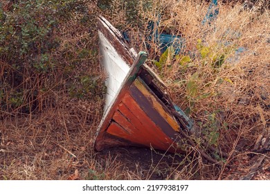 An Old Boat In The Dry Grassland . Lovely And Estetic Look.