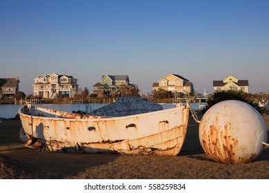 Old Boat And Houses At Nags Head, North Carolina