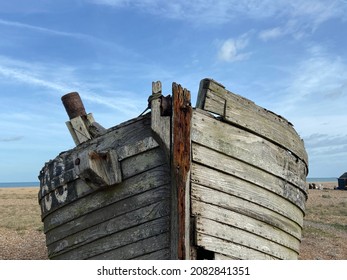 Old Boat Hull Wreck Wooden And Worn Background On Beach