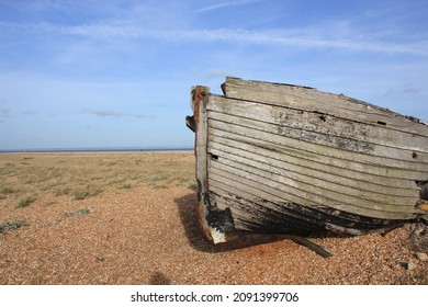 Old Boat Hull Wreck Wooden And Worn Background On Beach