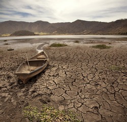 	Old Boat On Dry Lake