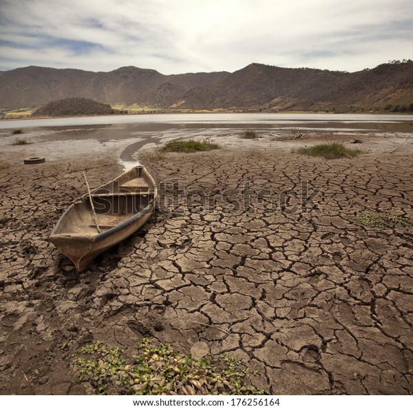 Old Boat On Dry Lake Stock Photo (Edit Now) 176256164