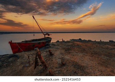 Old boat on the lake, Sunrise. soft focus - Powered by Shutterstock