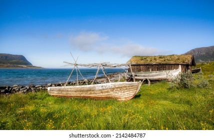 Old Boats And Hut From Sea Sami Culture In Finnmark, Norway