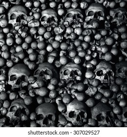 old bones and skulls in the Gothic vault of Kutna Hora with shallow depth of field