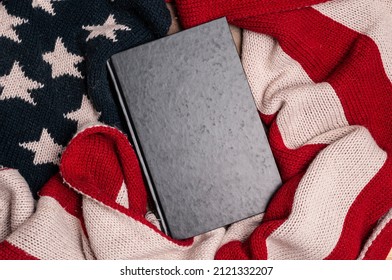 Old Book With Blank Cover Wrapped In A Wool Flag Of The United States Of America