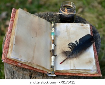 Old Book With Empty Pages, Magic Wand, Quill And Black Candle. Occult, Esoteric, Divination And Wicca Concept, Mystic Background