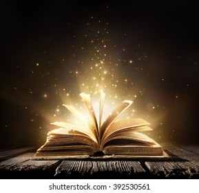 Old Book With Magic Lights On Vintage Table
 - Shutterstock ID 392530561