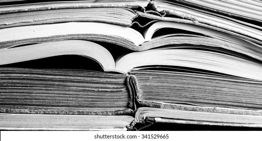 Old Book Open On A Wooden Table,black And White,horizontal Photo