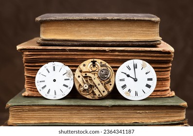 Old books and antique clock faces. Story book, storytelling, time background.