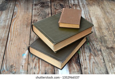 Old Books Found In The Attic. Science, Dust.Texture Background Of Old Tree.