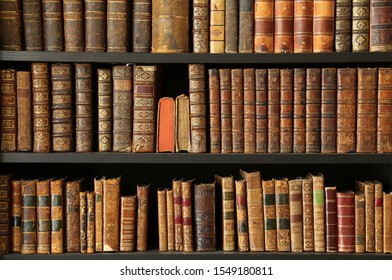 old books on wooden shelf - Shutterstock ID 1549180811