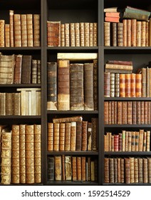 old books on wooden shelf - Shutterstock ID 1592514529