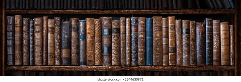 Old books on wooden shelf. Many of beautiful retro book covers, skins. Bookshelf history theme grunge background. Concept on the theme of history, nostalgia, retro.  - Shutterstock ID 2344630971