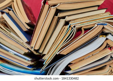 Old books piled up in a heap, close-up, learning and education concept. - Shutterstock ID 1841330482