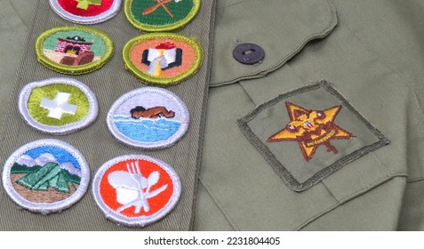 Old Boy Scout Uniform with Star Symbol and Colorful Merit Badge Sash. - Shutterstock ID 2231804405