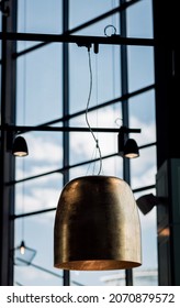 Old Brass Chandelier In Cafe. Metallic Lamp